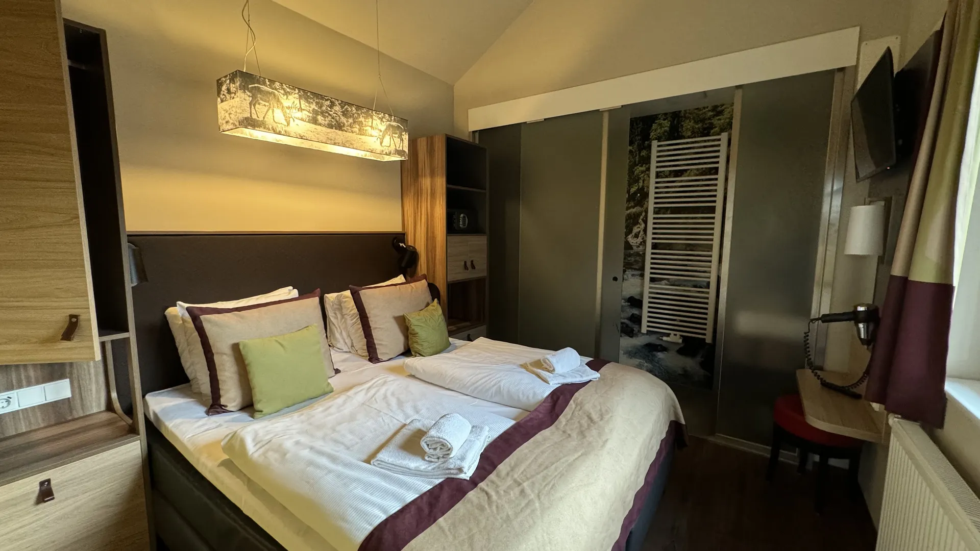 Drittes Schlafzimmer im VIP-Ferienhaus mit Einzelbetten