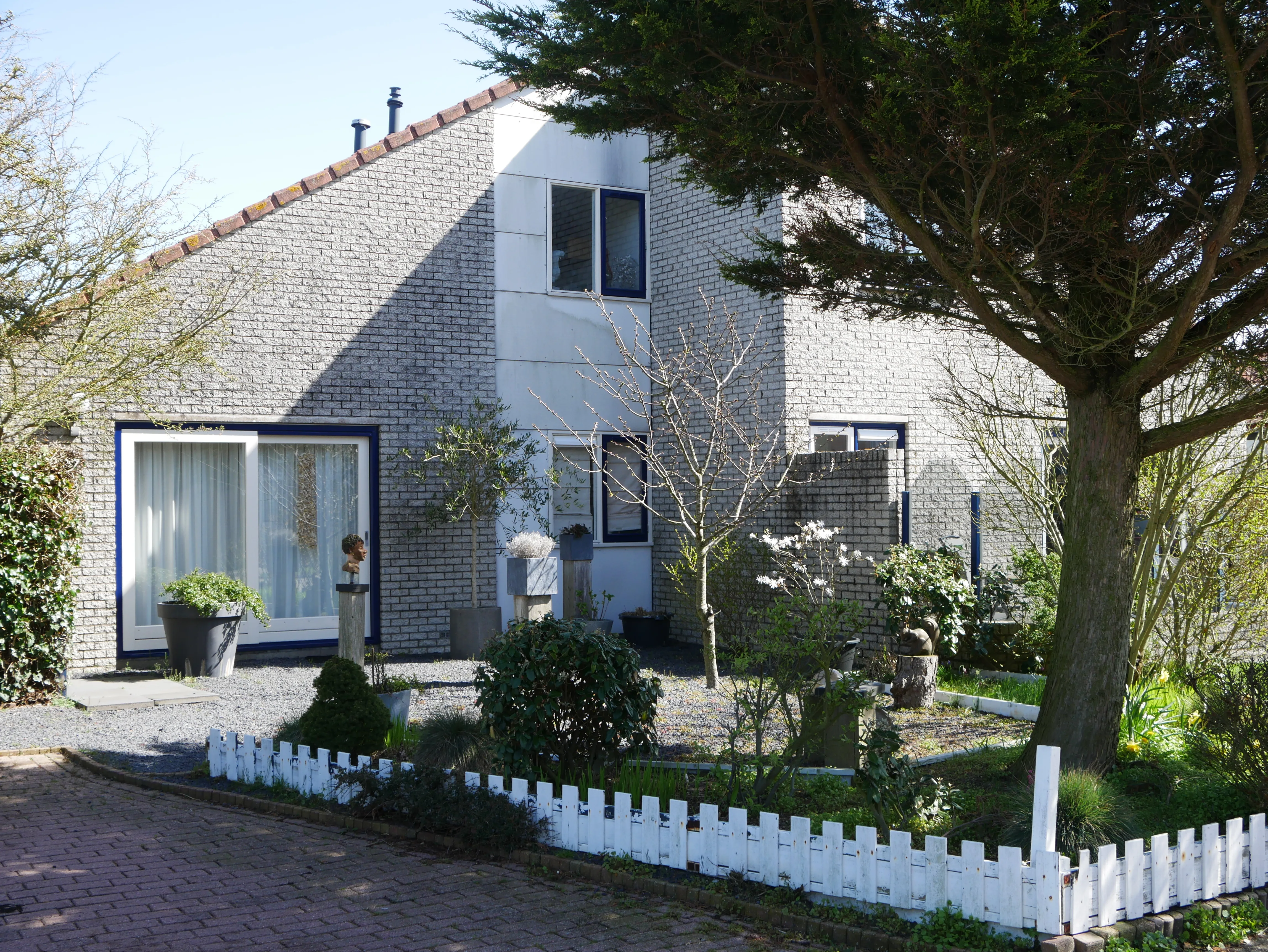 Individuell bepflanztes Ferienhaus